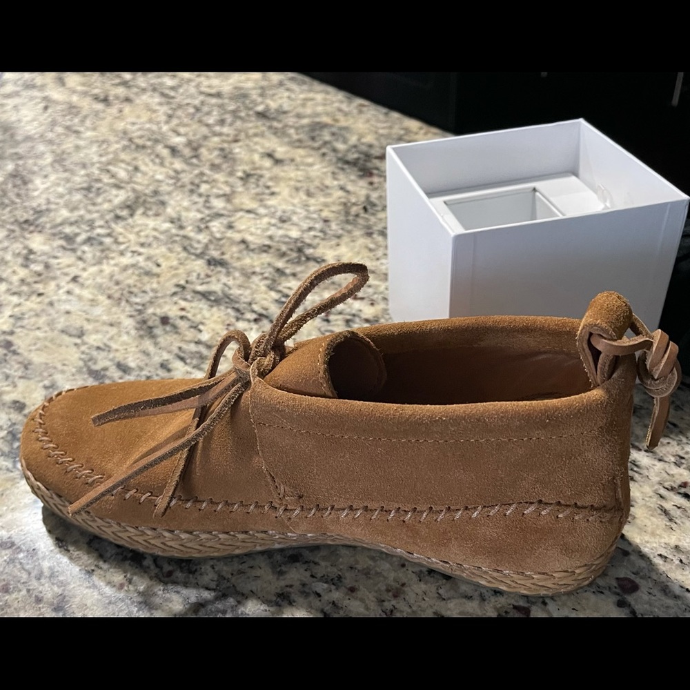 Authentic UGG ankle boot. Worn one time with box